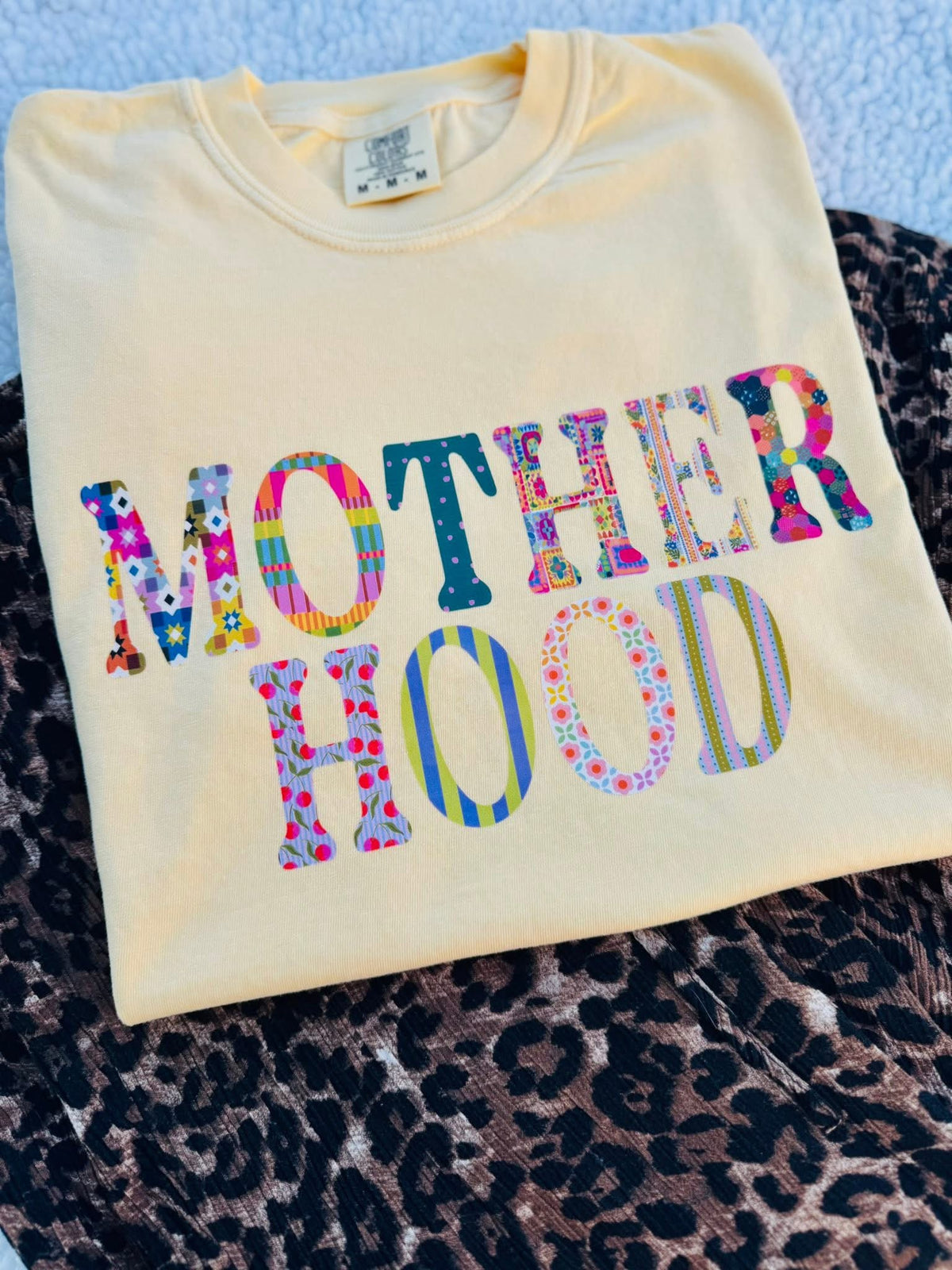 MOTHERHOOD
